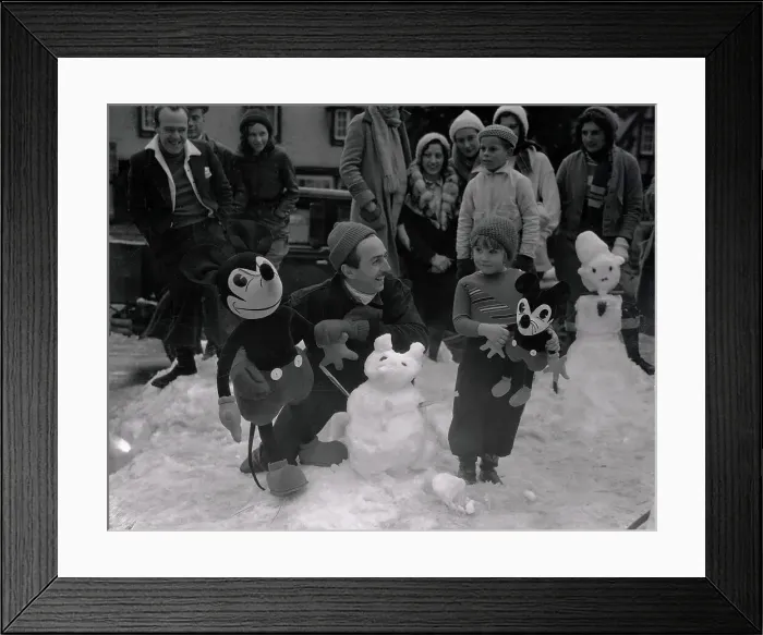 Framed Print : Walt Disney Judging Mickey Mouse Snowman Building Contest Framed Print : Walt Disney Judging Mickey Mouse Snowman Building Contest