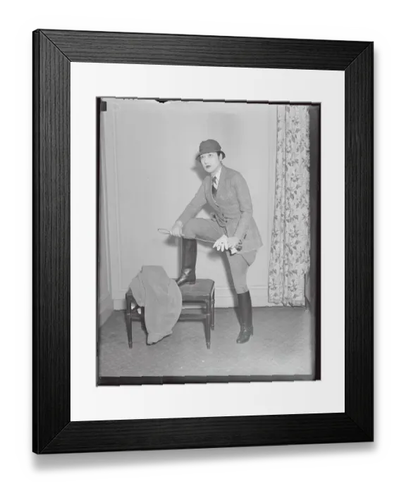 Framed Print : Model Posing with Propped Leg in Riding Suit