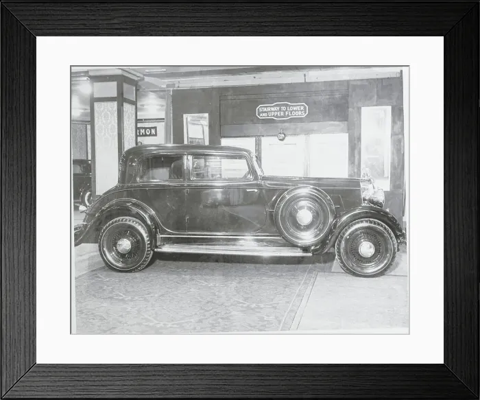 Framed Print : Showroom Display of Newly Designed Automobile Framed Print : Showroom Display of Newly Designed Automobile