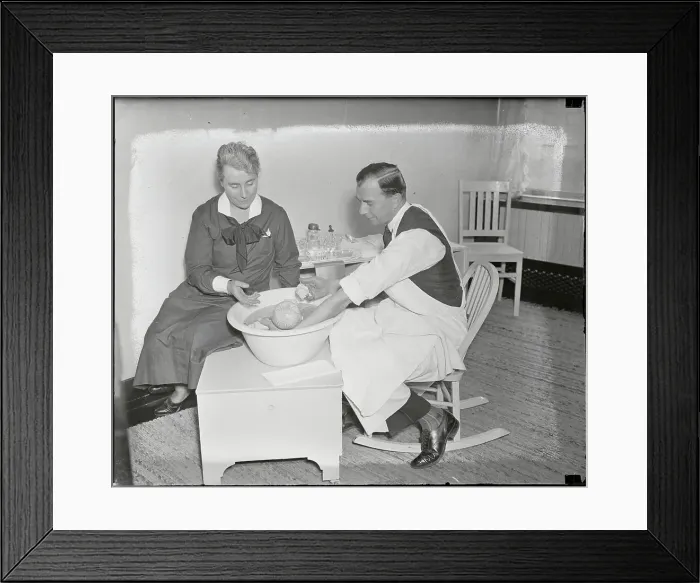 Framed Print : Nurse Instructing Father on Bathing His Baby Framed Print : Nurse Instructing Father on Bathing His Baby