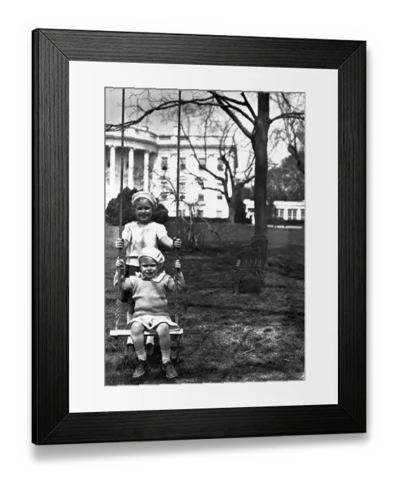 Framed Print : Anna Eleanor Dall Boettinger and Curtis Dall Boettiger on Swing Framed Print : Anna Eleanor Dall Boettinger and Curtis Dall Boettiger on Swing