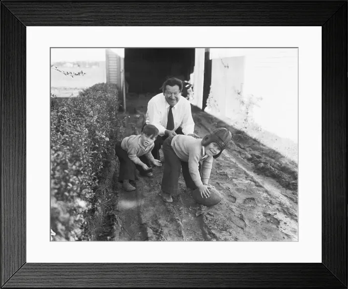 Framed Print : Jim Thorpe Playing Football with His Sons Framed Print : Jim Thorpe Playing Football with His Sons