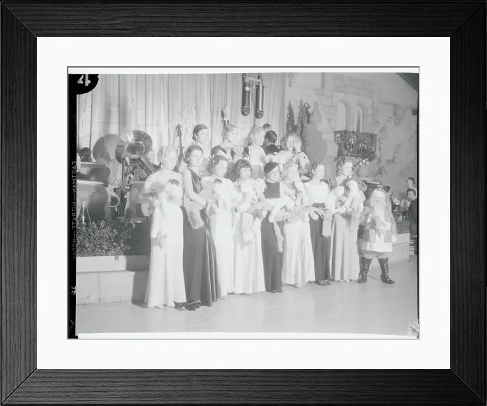Framed Print : Celebrities Posing Together at Christmas Party