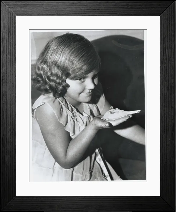 Framed Print : Girl with Bird in Palm of Her Hand Framed Print : Girl with Bird in Palm of Her Hand