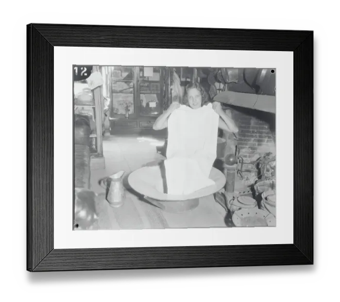 Framed Print : Woman Sitting in Old Bath Tub Framed Print : Woman Sitting in Old Bath Tub