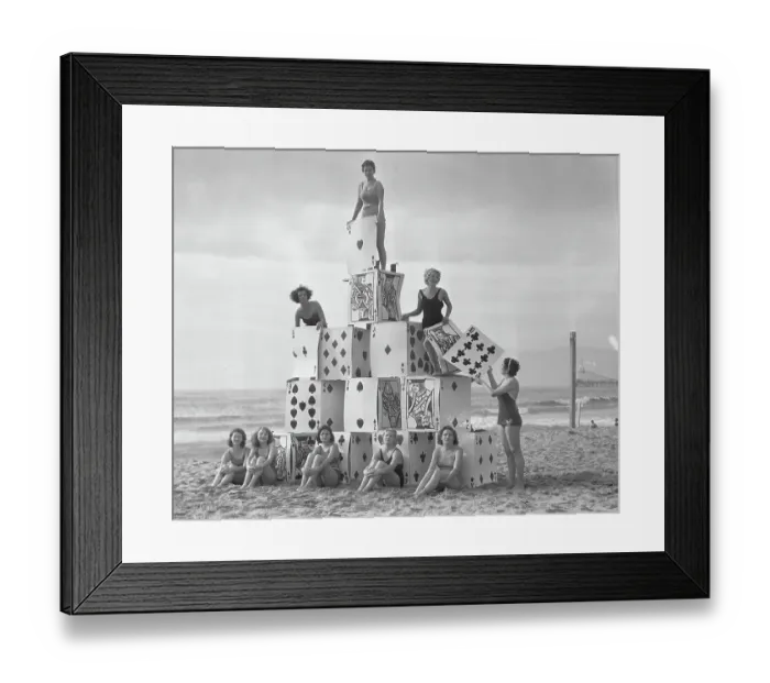 Framed Print : Girls Building Giant House of Cards Framed Print : Girls Building Giant House of Cards
