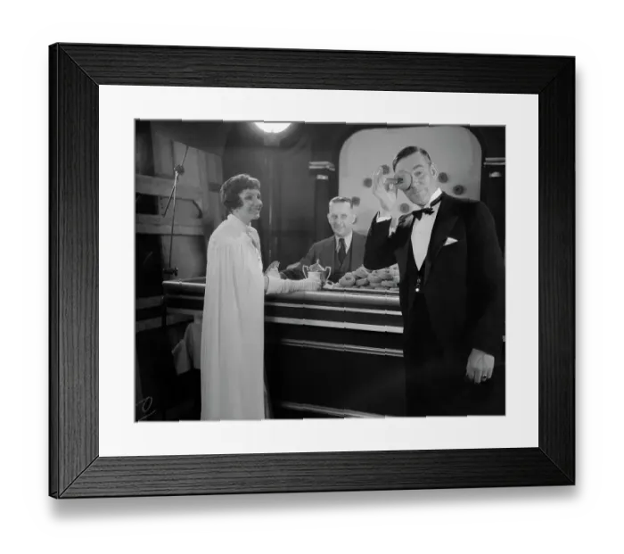 Framed Print : Claudette Colbert and Walter Huston Having Doughnuts Framed Print : Claudette Colbert and Walter Huston Having Doughnuts