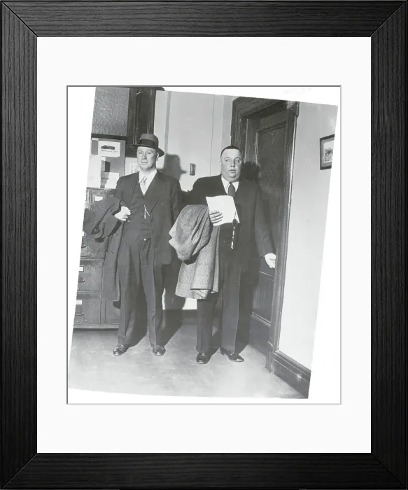 Framed Print : Police Chief and Warden Arriving for Extradition of Suspect Framed Print : Police Chief and Warden Arriving for Extradition of Suspect