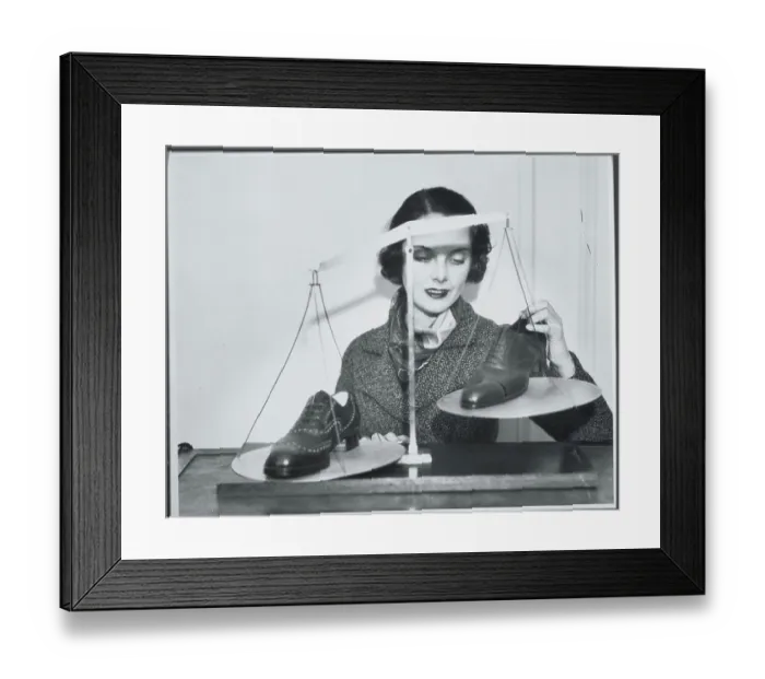 Framed Print : Woman Weighing Shoes on Scale Framed Print : Woman Weighing Shoes on Scale