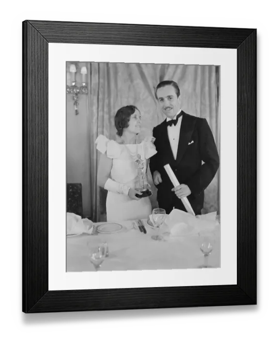Framed Print : Walt Disney and Wife Holding Oscar Framed Print : Walt Disney and Wife Holding Oscar