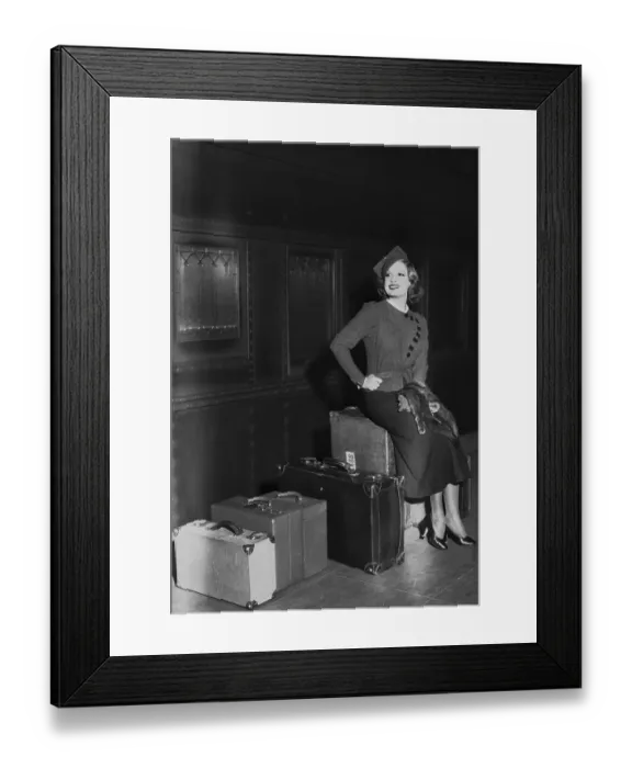 Framed Print : Lili Damita Sitting on Sitting on Suitcases Framed Print : Lili Damita Sitting on Sitting on Suitcases