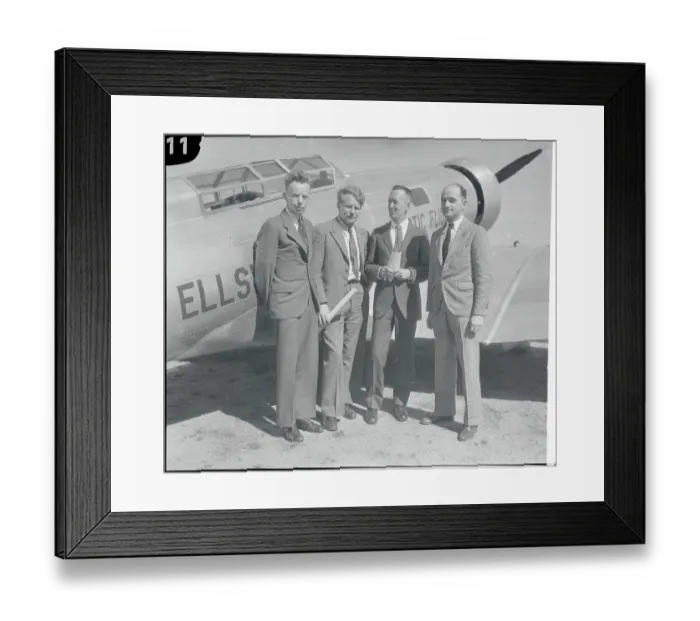 Framed Print : Men Standing in Front of Plane Framed Print : Men Standing in Front of Plane