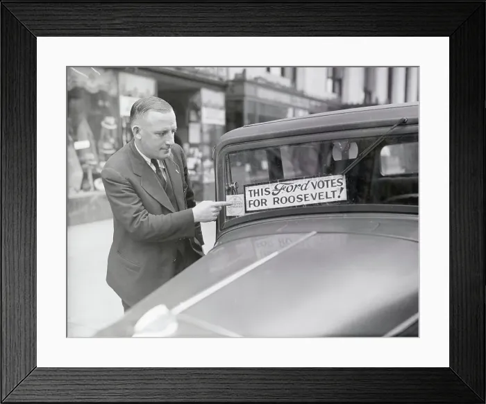 Framed Print : Jerome T. Harriman Pointing to Sticker on Car Framed Print : Jerome T. Harriman Pointing to Sticker on Car