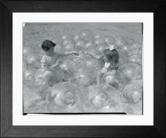 Framed Print : Girls Playing Inside Glass Balls Framed Print : Girls Playing Inside Glass Balls