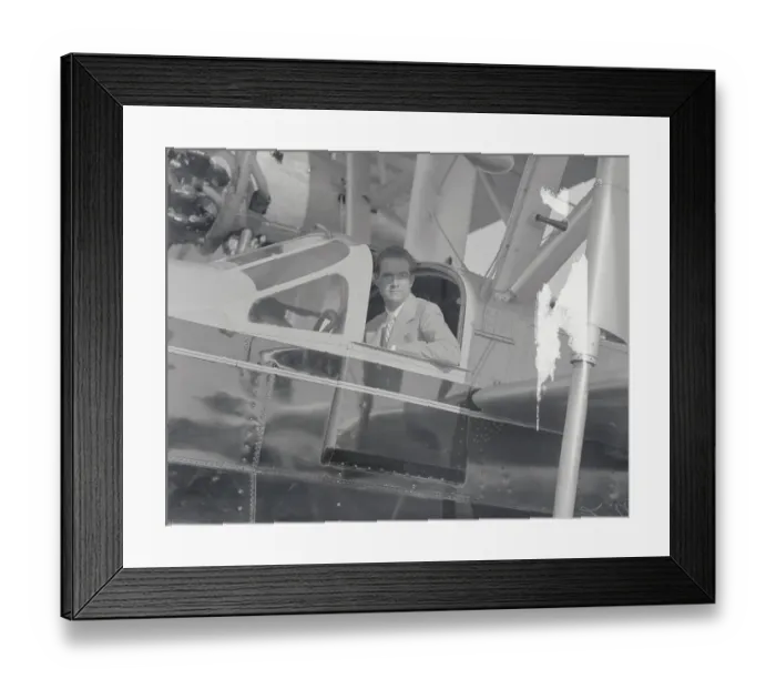 Framed Print : Howard Hughes Sitting in Plane Framed Print : Howard Hughes Sitting in Plane