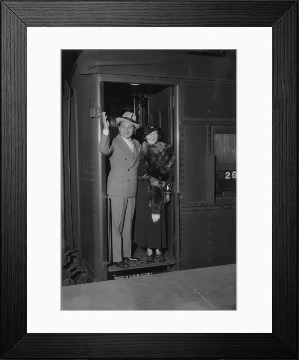 Framed Print : Edward Robinson Waving from Doorway with His Wife Framed Print : Edward Robinson Waving from Doorway with His Wife