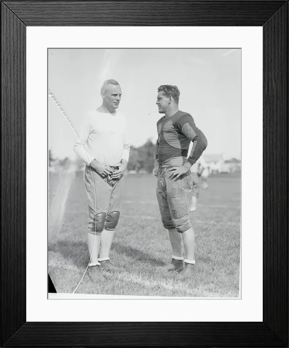 Framed Print : Football Coach and Captain Conversing Framed Print : Football Coach and Captain Conversing
