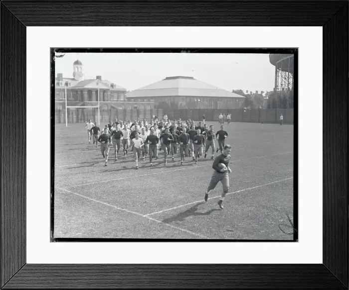 Framed Print : Harvard Teammates Jogging on Field Framed Print : Harvard Teammates Jogging on Field