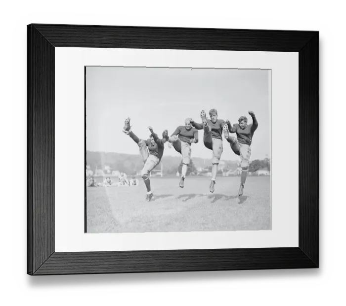 Framed Print : Football Players Practicing Kicking Framed Print : Football Players Practicing Kicking