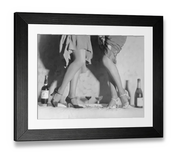 Framed Print : Women Modeling Shoes near Wine Bottles Framed Print : Women Modeling Shoes near Wine Bottles