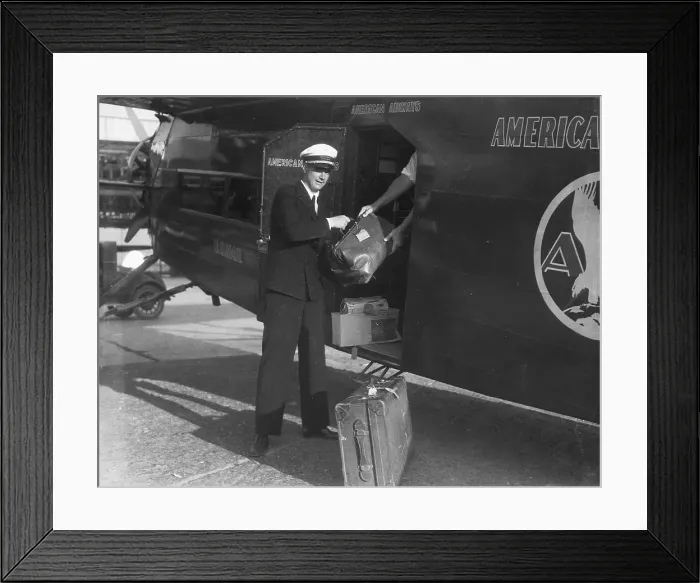 Framed Print : Howard Hughes Loading Baggage On Plane