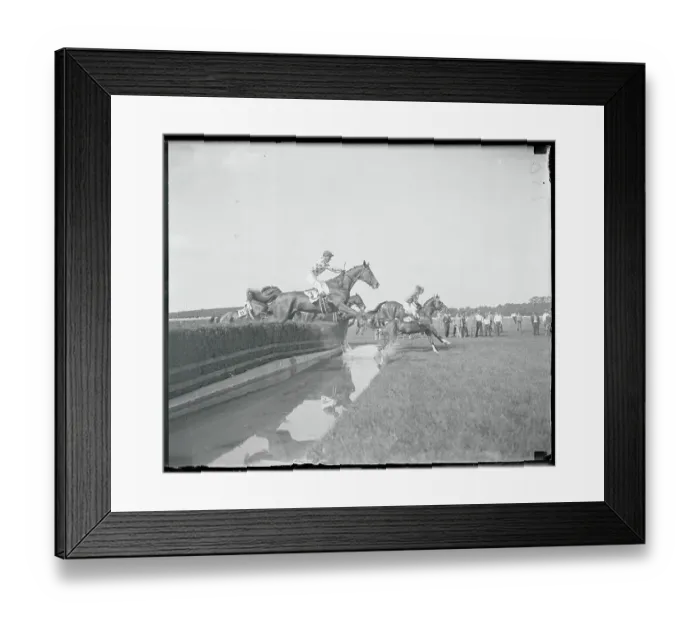 Framed Print : Jockeys Riding Horse and Jumping During Competition Framed Print : Jockeys Riding Horse and Jumping During Competition