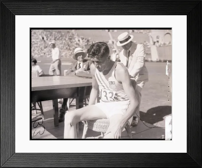 Framed Print : Tired Runner Seated After Race Framed Print : Tired Runner Seated After Race