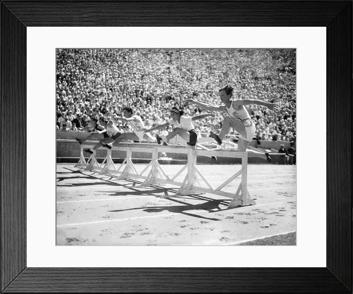 Framed Print : Babe Didrikson Competing in 80-Meter Hurdle Race Framed Print : Babe Didrikson Competing in 80-Meter Hurdle Race