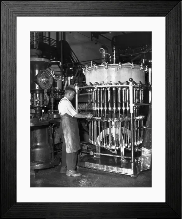 Framed Print : Man Cleaning Glass-Lined Beer Tank Framed Print : Man Cleaning Glass-Lined Beer Tank