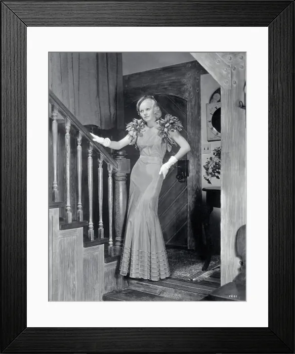 Framed Print : Actress Jean Harlow in Formal Dress Posing by Staircase