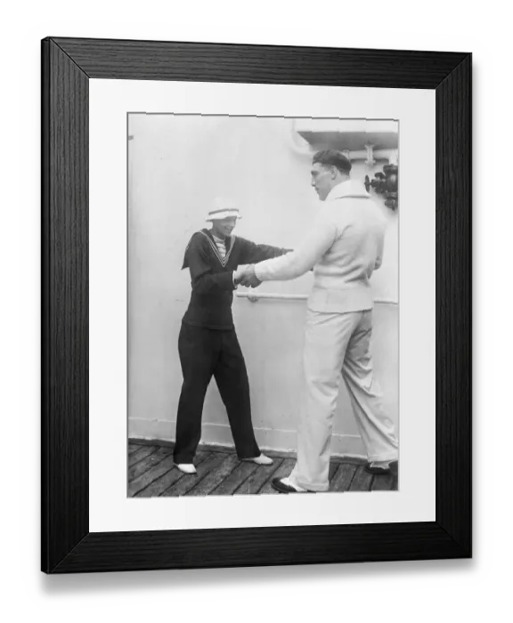 Framed Print : Primo Carnera Showing Amelia Earhart Boxing Stance Framed Print : Primo Carnera Showing Amelia Earhart Boxing Stance
