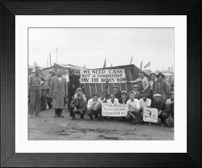 Framed Print : Bonus Veterans Crouch Beneath Banner Framed Print : Bonus Veterans Crouch Beneath Banner