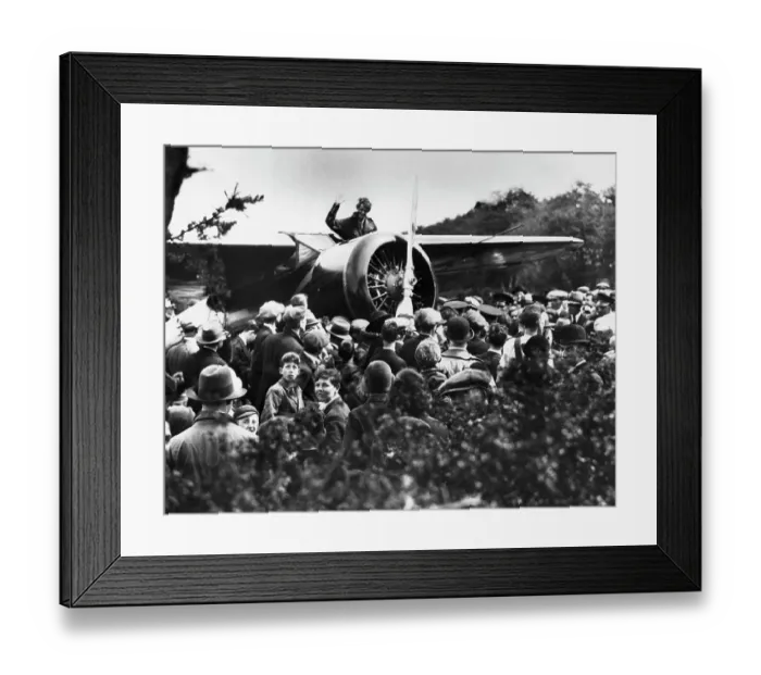 Framed Print : Amelia Earhart Acknowledging Fans from Her Airplane