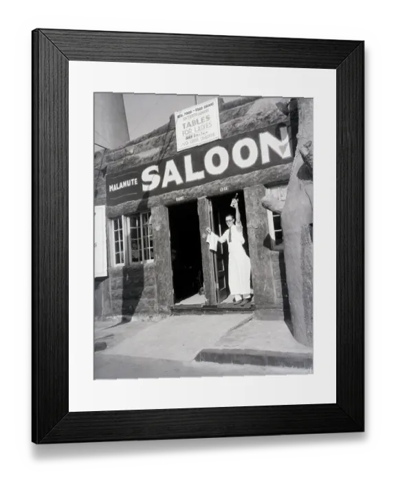 Framed Print : Man With Bottle In Door Of Malemute Salo Framed Print : Man With Bottle In Door Of Malemute Salo