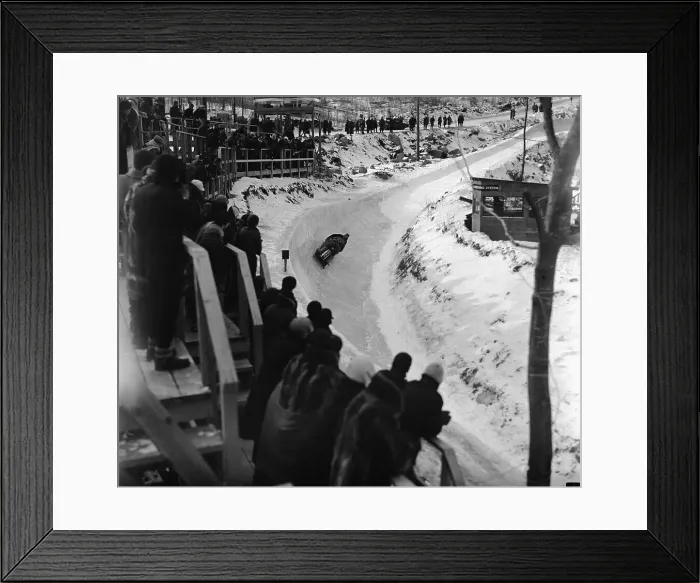 Framed Print : Bobsled Team Rounding Curve