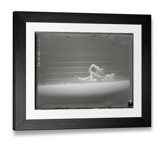 Framed Print : Wrestler Performing Toe Hold Move Framed Print : Wrestler Performing Toe Hold Move