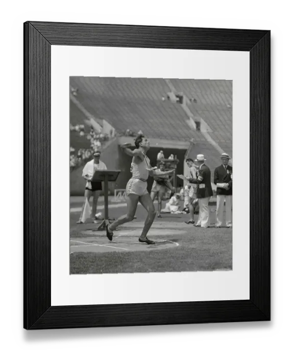 Framed Print : United States W. Charles Performing in The Decathlon Discus Event at Olympics