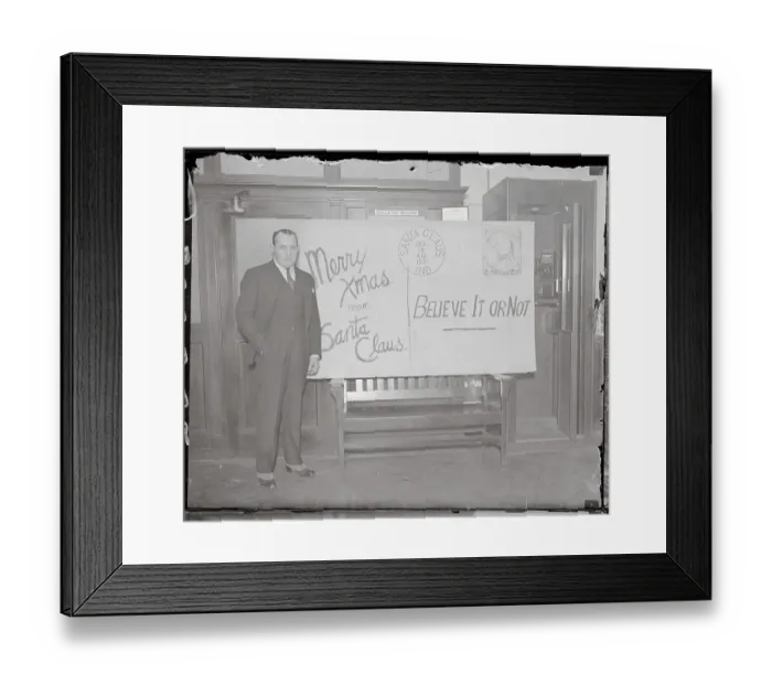 Framed Print : Robert L. Ripley Posing by Large Card Framed Print : Robert L. Ripley Posing by Large Card