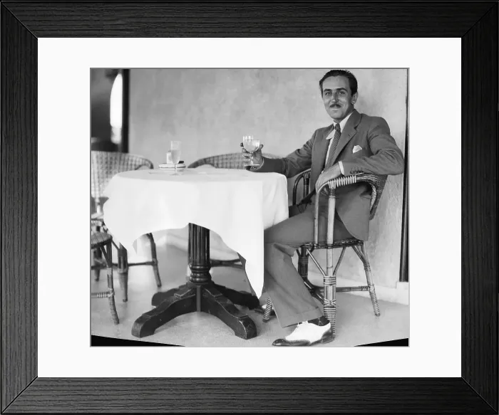 Framed Print : Walt Disney Sitting at Table Framed Print : Walt Disney Sitting at Table