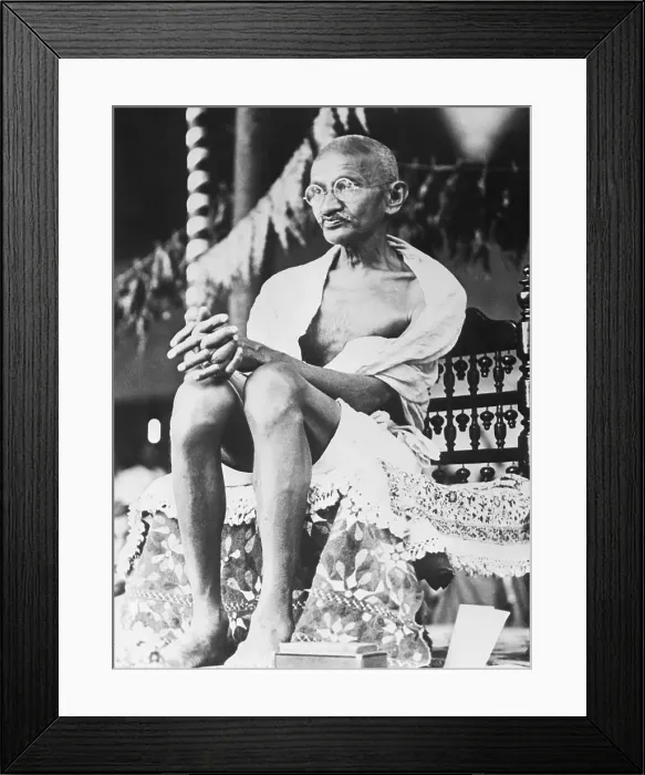 Framed Print : Gandhi Seated and in Traditional Clothing Framed Print : Gandhi Seated and in Traditional Clothing