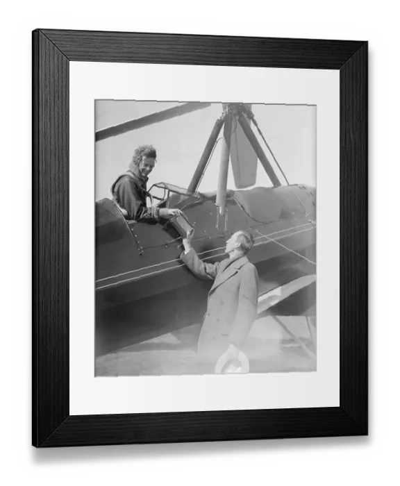 Framed Print : Amelia Earhart Handing Barograph to Luke Christopher Framed Print : Amelia Earhart Handing Barograph to Luke Christopher