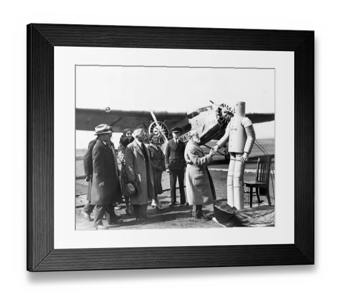 Framed Print : Robot Shakes Elderly Pilot'S Hand Framed Print : Robot Shakes Elderly Pilot'S Hand