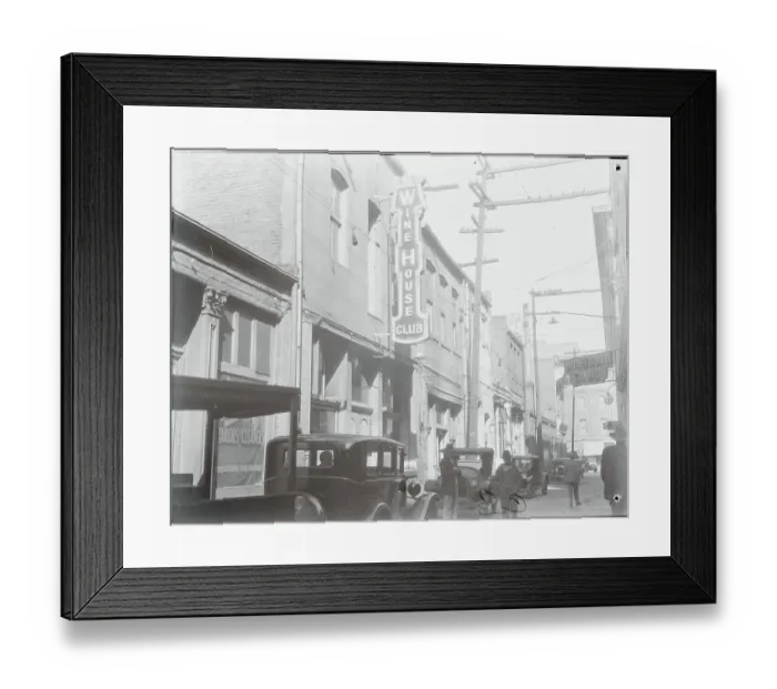 Framed Print : Pedestrians and automobiles near Wine House