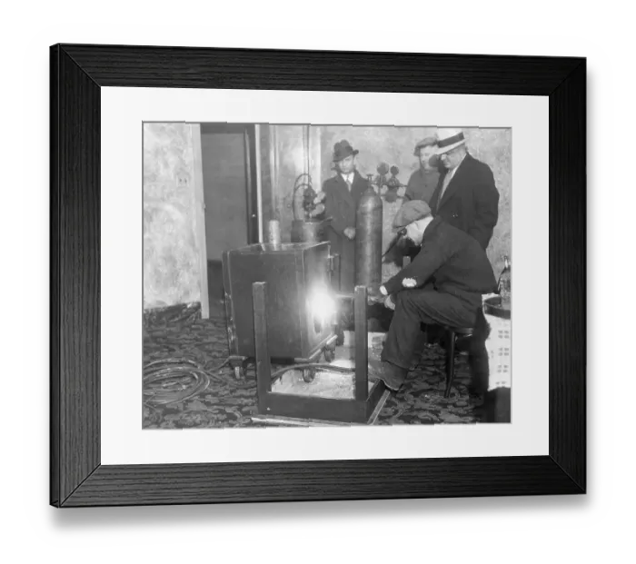 Framed Print : Man Drilling Open a Safe Framed Print : Man Drilling Open a Safe