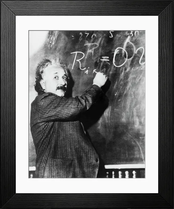 Framed Print : Einstein Writing Equation on Blackboard Framed Print : Einstein Writing Equation on Blackboard