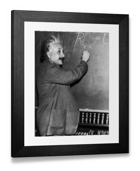 Framed Print : Albert Einstein Writing Mathematic Formulas on Blackboard Framed Print : Albert Einstein Writing Mathematic Formulas on Blackboard