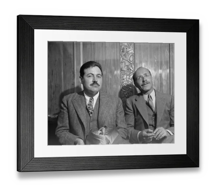 Framed Print : Ernest Hemingway Sitting with Donald Ogdon Stewart Framed Print : Ernest Hemingway Sitting with Donald Ogdon Stewart