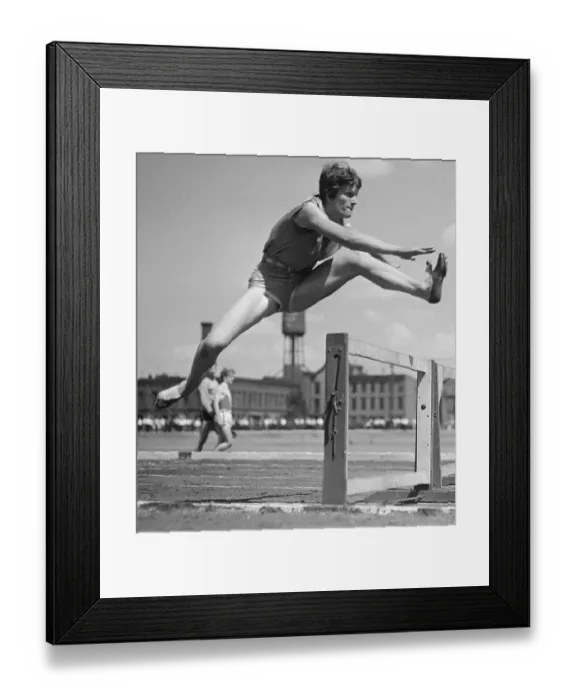 Framed Print : Babe Didrickson Jumping over Hurdle Framed Print : Babe Didrickson Jumping over Hurdle