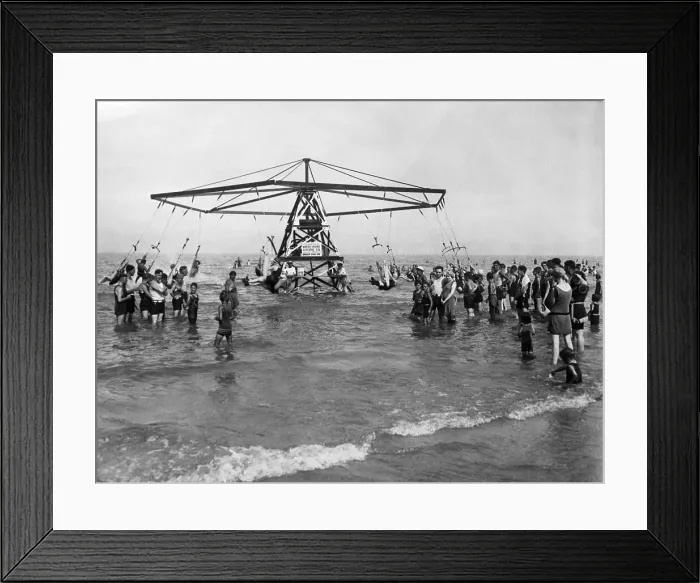 Framed Print : People on carousel in sea Framed Print : People on carousel in sea