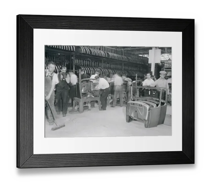 Framed Print : Men Working on an Assembly Line Framed Print : Men Working on an Assembly Line